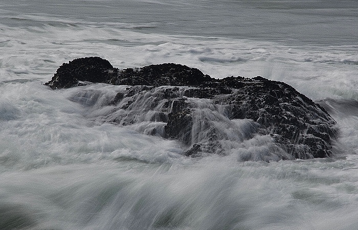 rushing water over rocks in slow motion